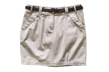 Beige mini skirt with a belt isolated over whiteの写真素材