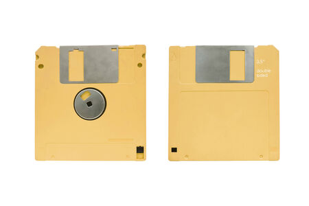 Front and back side of blank yellow floppy disk isolated over whiteの写真素材