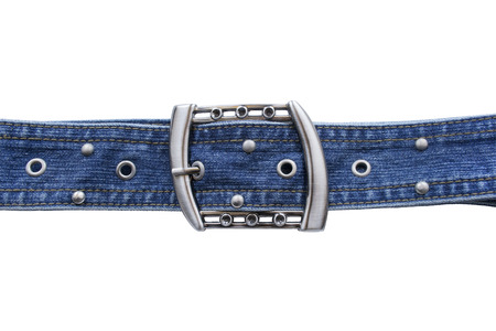 Jean belt with silver buckle and rivets on white の写真素材