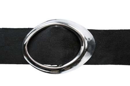 Black suede belt with oval silver buckle isolated over whiteの写真素材
