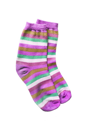 Striped pink knitwear socks isolated over whiteの写真素材