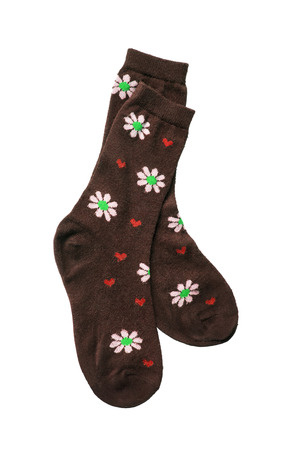 Brown knitted socks on white backgroundの写真素材