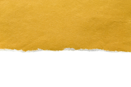 Ragged yellow blank paper over white as a backgroundの写真素材