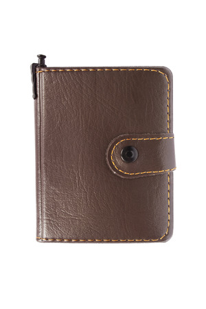 Brown leather bound diary on white backgroundの写真素材