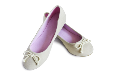Pair of elegant textile flat shoes isolated over whiteの写真素材