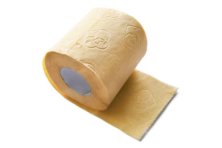 Roll of yellow toilet paper on white backgroundの写真素材