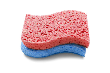 Pink and blue sponges on white backgroundの写真素材