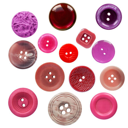 Set of different buttons in shades of pink on white backgroundの写真素材