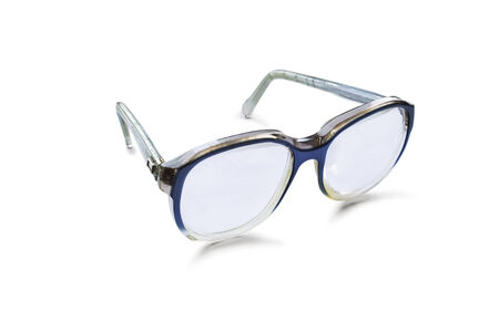 Vintage eyeglasses in blue plastic frame isolated over whiteの写真素材