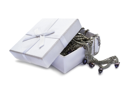 White box full of jewels isolated over whiteの写真素材