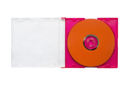 Blank orange CD in opened box isolated over whiteの写真素材