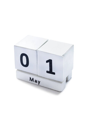 Desk calendar with a date may 1st on white bacgkroundの写真素材