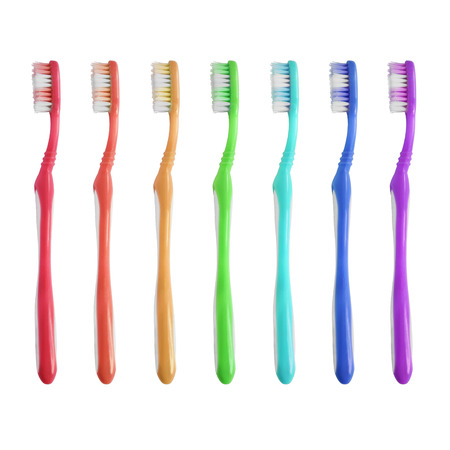 Set of colorful toothbrushes isolated over whiteの写真素材