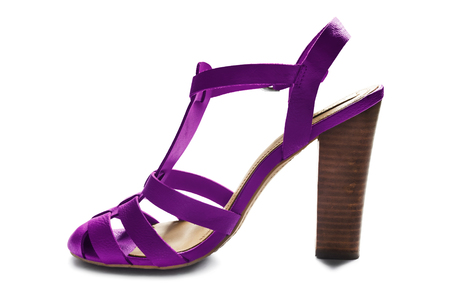 Purple leather high heeled slingback shoe isolated over whiteの写真素材