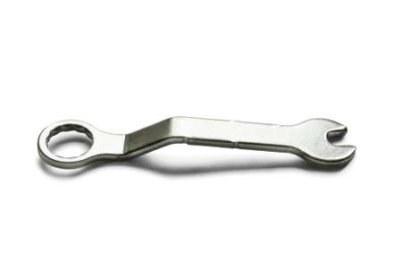 Metal universal wrench isolated over whiteの写真素材