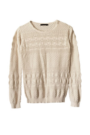 Beige delicate knitted pullover on white backgroundの写真素材
