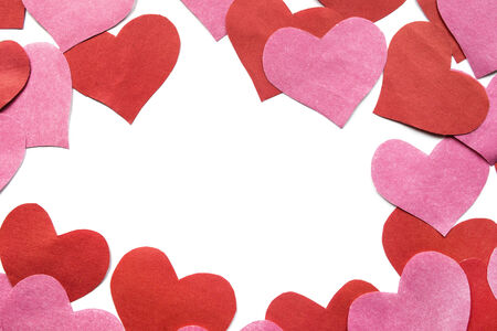 Paper red and pink hearts isolated over white as a backgroundの写真素材