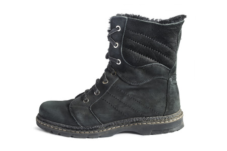 Black shammy winter high boot isolated over whiteの写真素材
