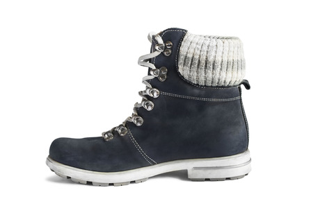 Dark blue nubuck leather hiking boot isolated over whiteの写真素材