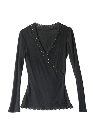 Black blouse decorated with lace and crystals isolated over whiteの写真素材