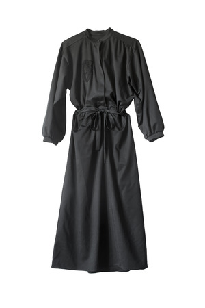 Black silk long dress on white backgroundの写真素材