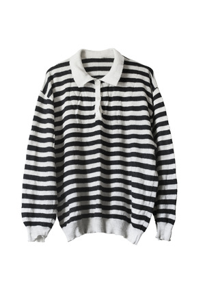 Black and white striped knitted polo on white backgroundの写真素材