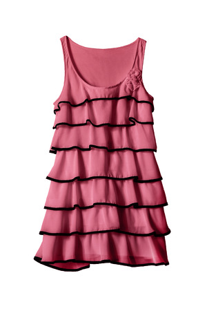 Beautiful pink dress with frills on white backgroundの写真素材