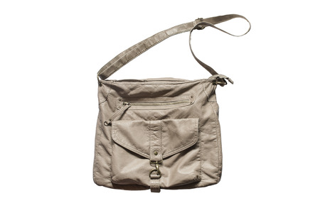 Beige leather shoulder bag isolated over whiteの写真素材