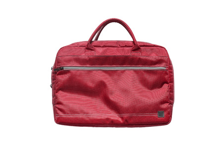 Red textile laptop bag isolated over whiteの写真素材