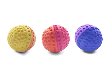 Group of three rubber bicolor balls on white backgroundの写真素材