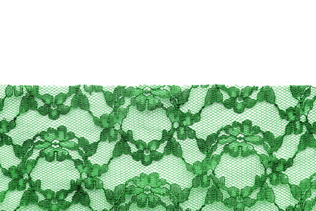 Green vintage floral lace over white as a backgroundの写真素材