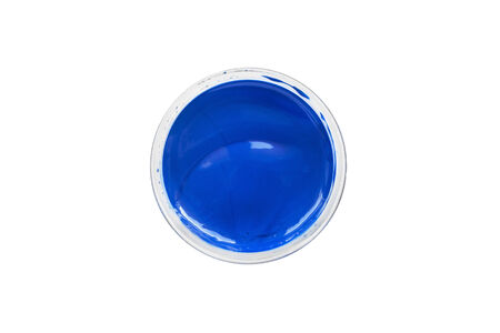 Blue color paint in a jar on white backgroundの写真素材