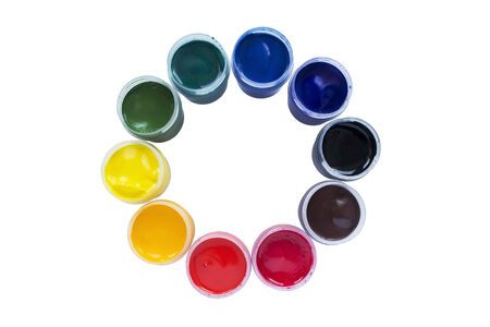 Jars of multicolor paint isolated over whiteの写真素材