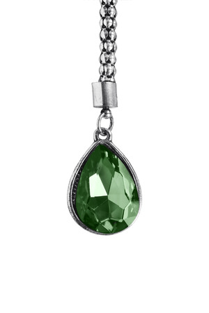 Big emerald pendant on silver chain isolated over whiteの写真素材