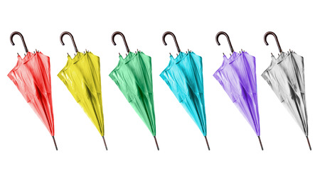 Set of multicolor cane umbrellas isolated over whiteの写真素材