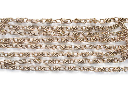 Old golden chain on white as a backgroundの写真素材