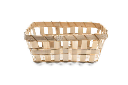 Wicker straw basket on white backgroundの写真素材