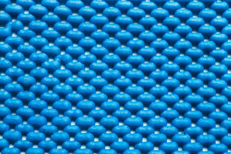 Blue rubber mat texture as a background closeupの写真素材