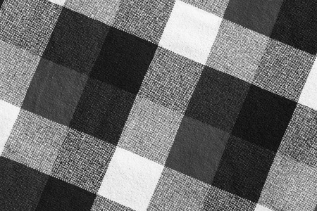 Black and white wool plaid material as a backgroundの写真素材