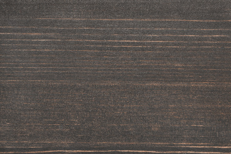 Dark brown wooden texture as a backgroundの写真素材