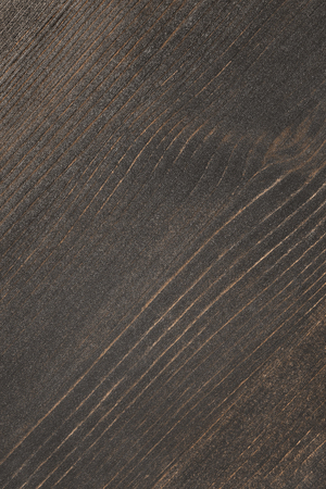 Dark brown wooden texture as a backgroundの写真素材