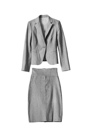 Female gray formal skirt suit isolated over whiteの写真素材