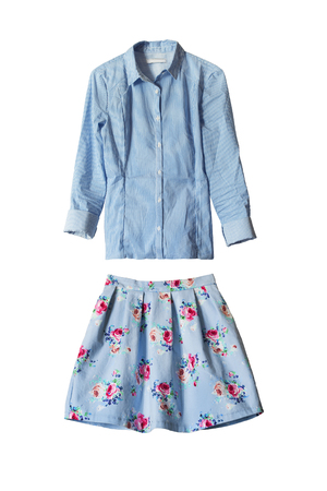 Set of blue mini skirt and blouse isolated over whiteの写真素材