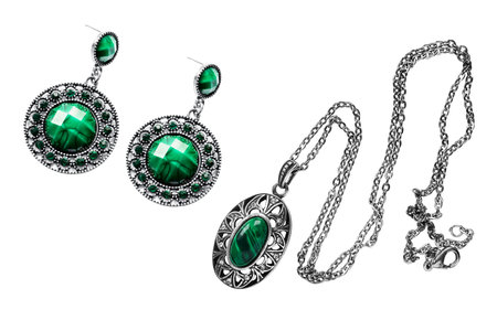 Set of vintage malachite pendant and earrings on white backgroundの写真素材