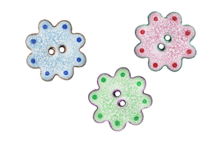 Group of colorful funny buttons isolated over whiteの写真素材