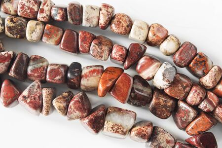 Strings of jasper beads as a backgroundの写真素材