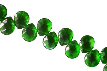 String of emerald beads on white backgroundの写真素材