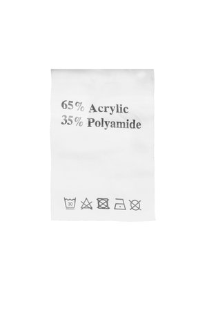 Washing instructions and fabric composition label on white background