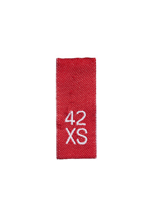 Red XS size label on white backgroundの写真素材