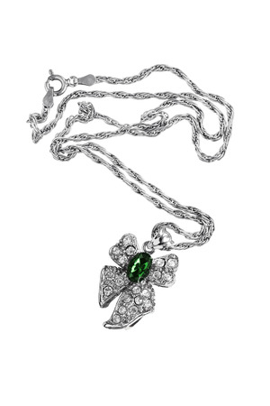 Emerald pendant in the shape of a bow on white backgroundの写真素材